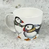 emma-ball-knitting-puffins-mug-1.webp